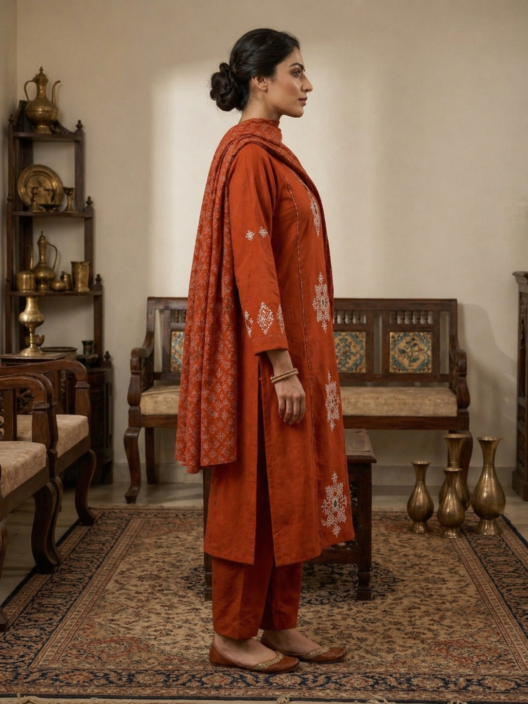Burnt Orange Pure Cotton Ensemble Suit Set side view showcasing geometric kalka patterns, mirror detailing and colorful piping accents