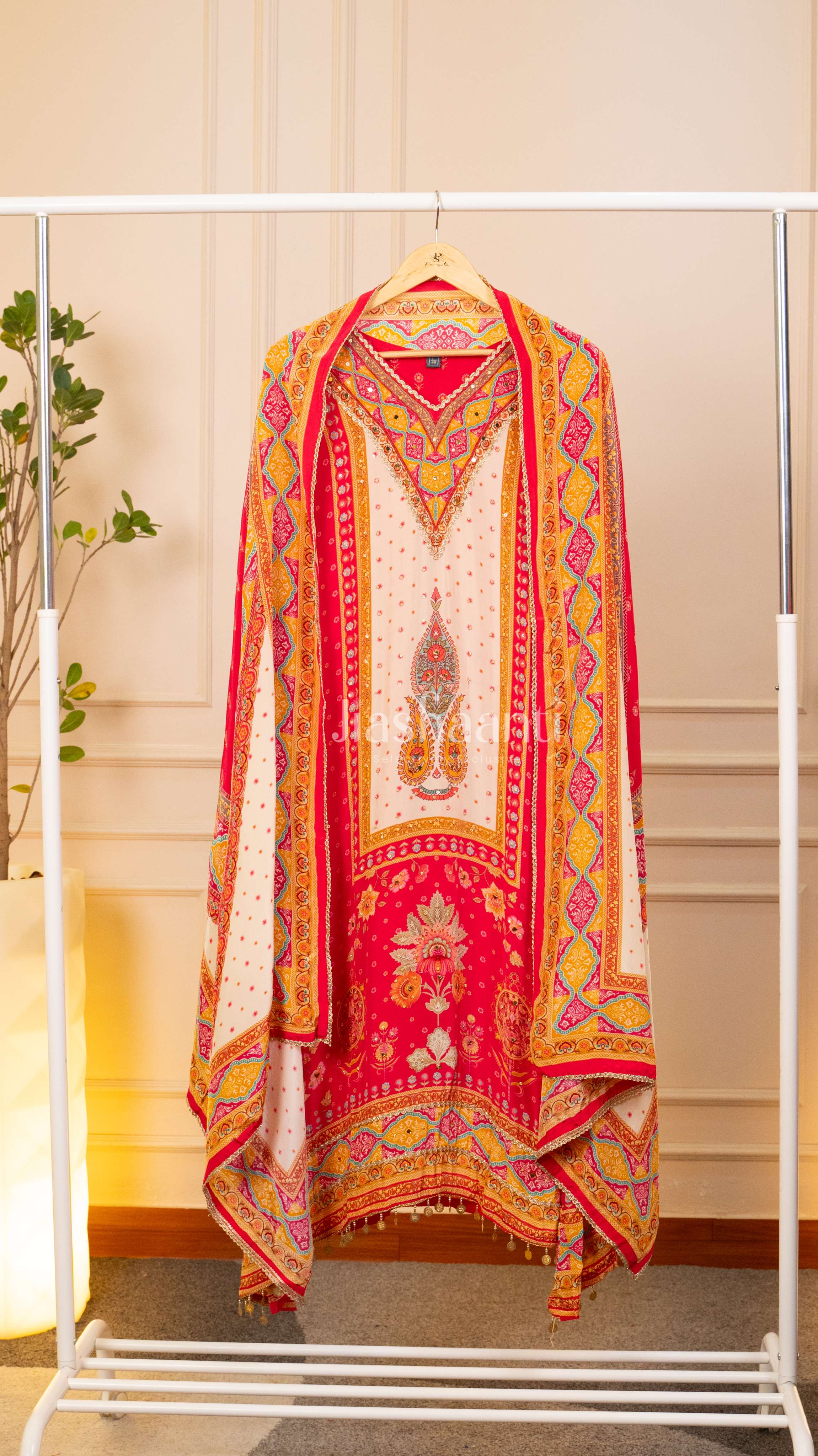 Striking Crimson and Golden Unstitched Suit Set front view featuring rich crimson color, golden detailing and elegant ethnic design