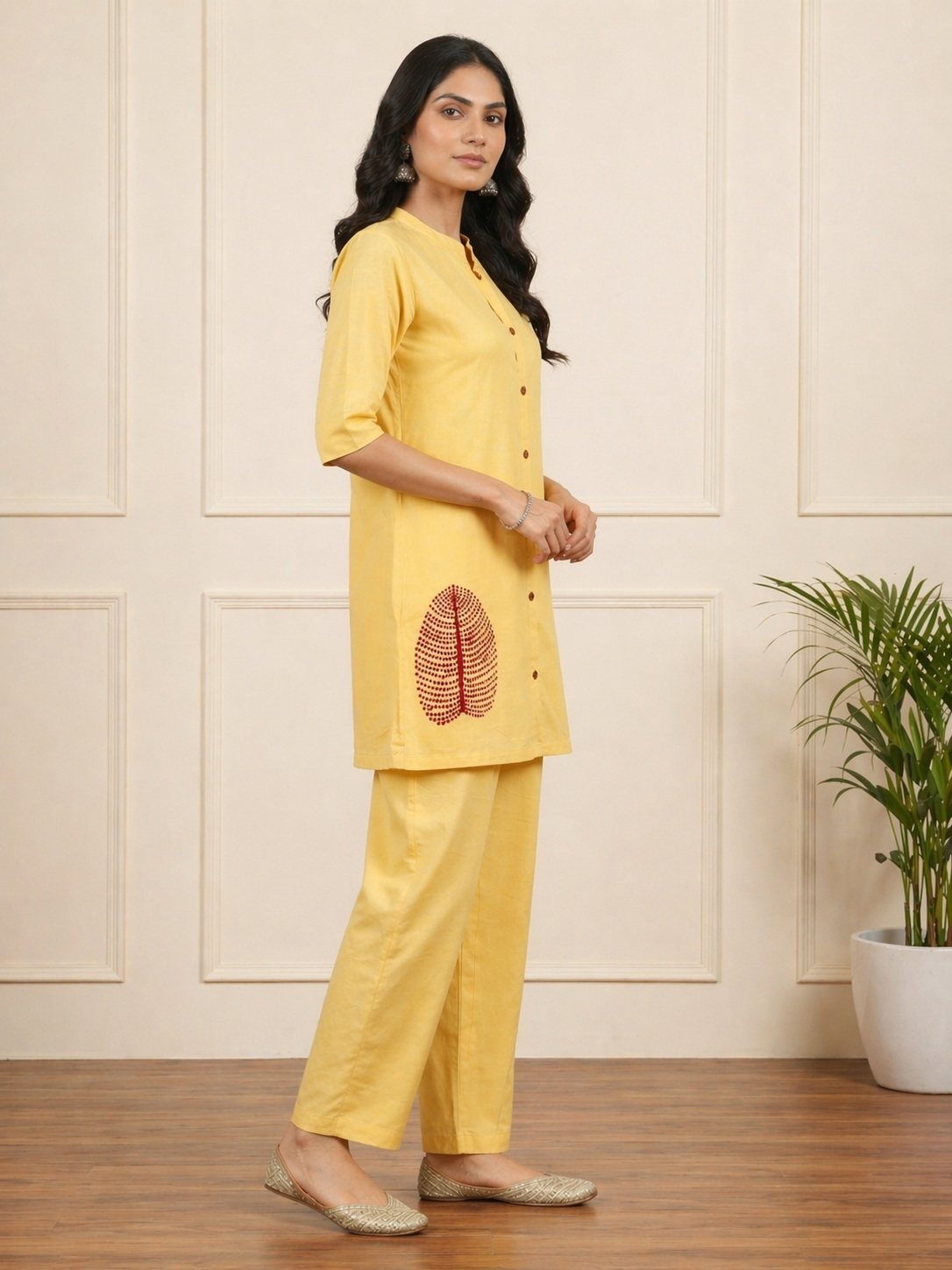 Comfortable yellow mul cotton co-ord set for women — highlighting French knot embroidery detailing, relaxed fit and breathable pure cotton fabric finish