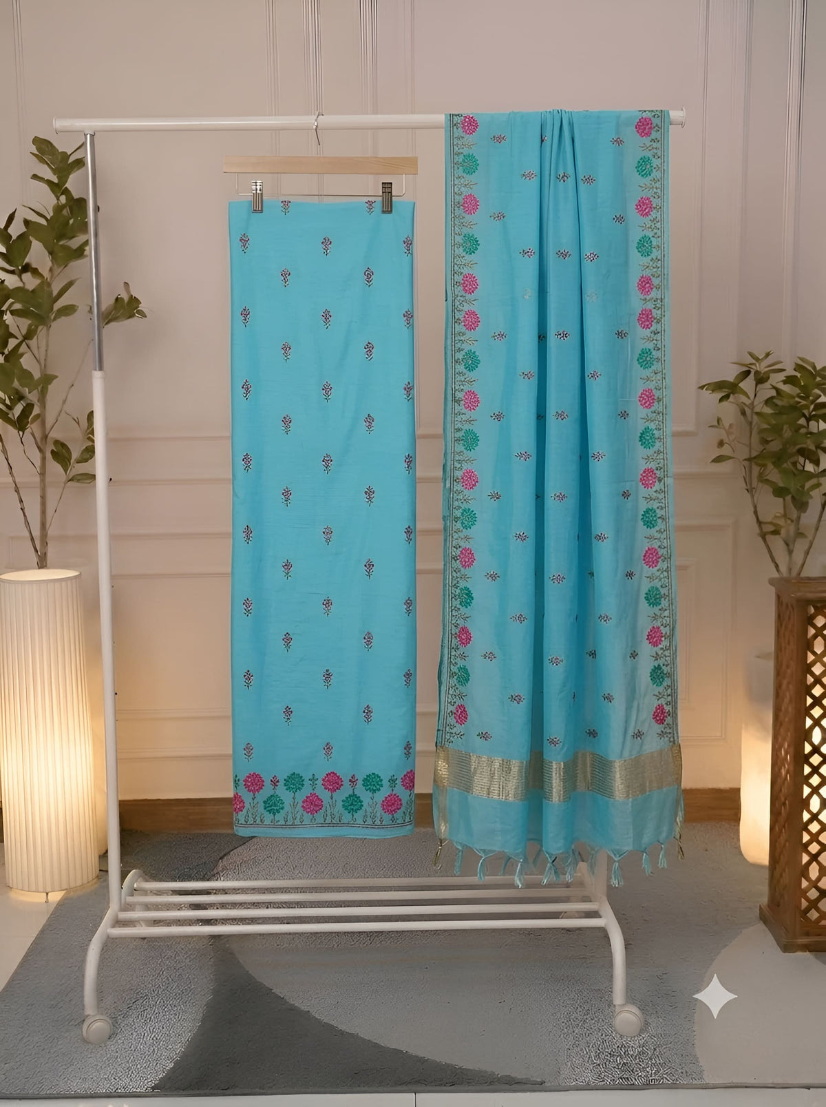 Turquoise Blue Cotton Silk suit fabric with floral embroidered zari border dupatta hanging on display stand
